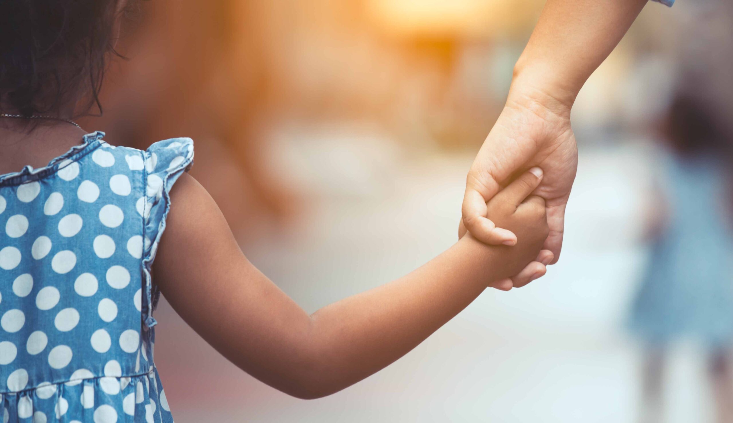 Holding child's hand